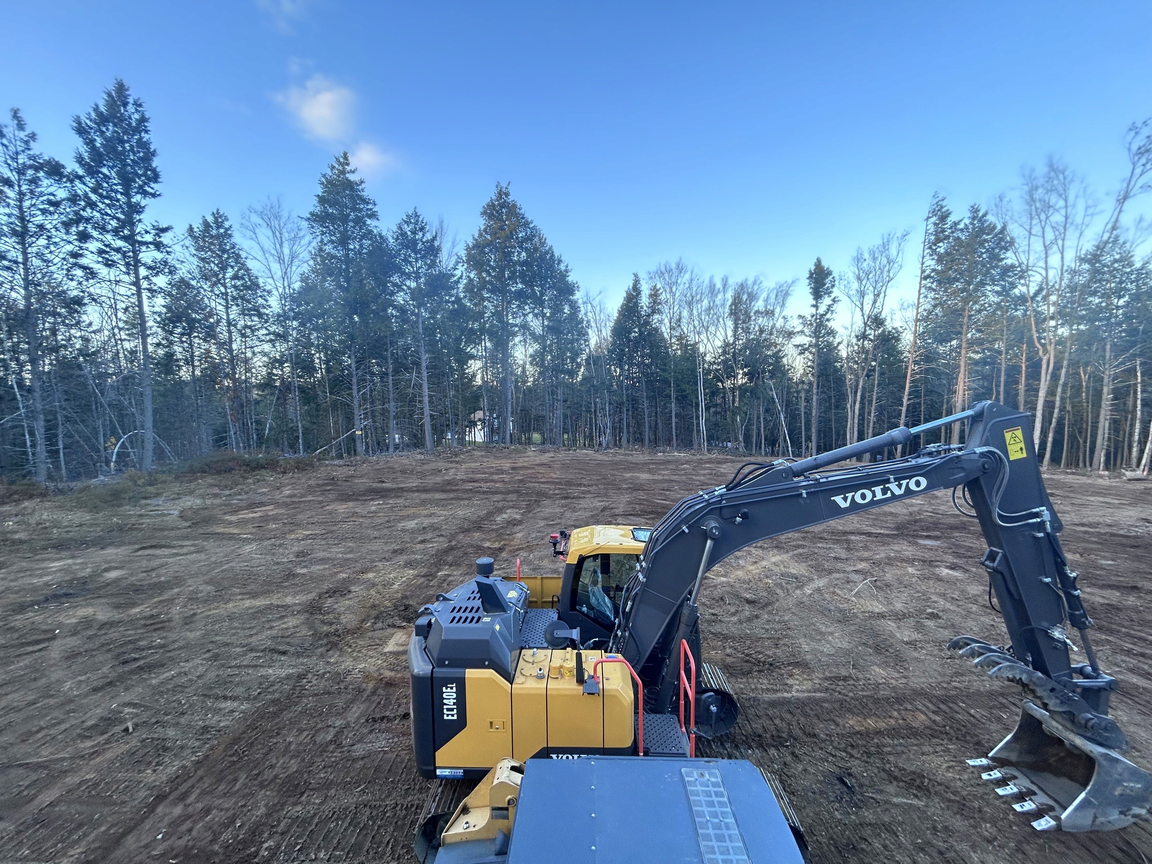 207 Excavation equipment preparing a site in Maine